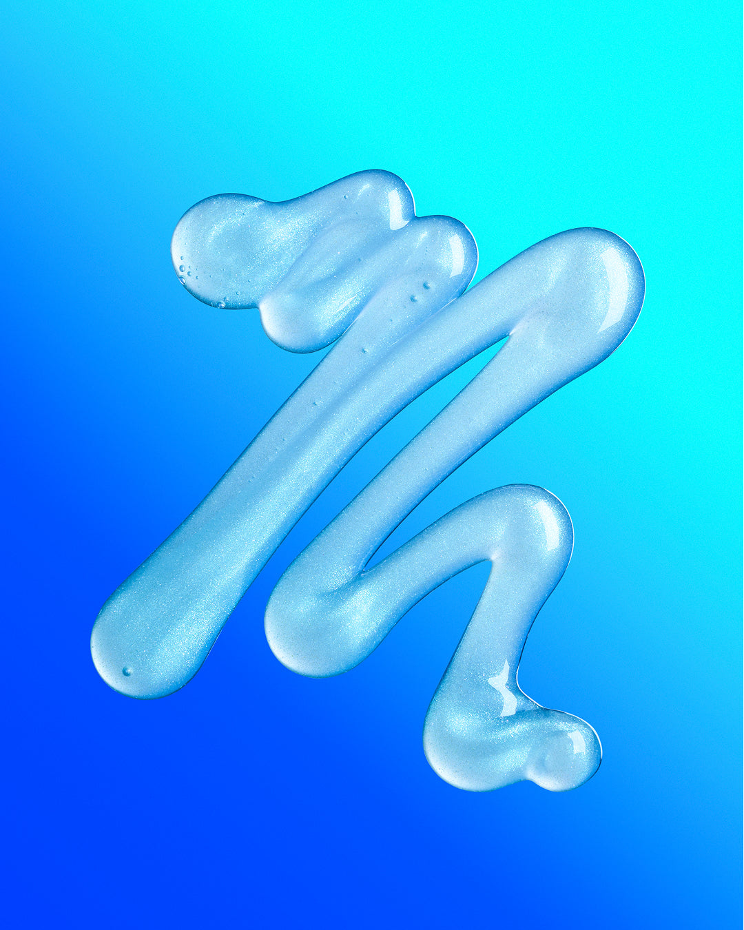 Closeup of the gel texture of Starface Star Wash® + Salicylic Acid. A light, airy oil-free cleanser.